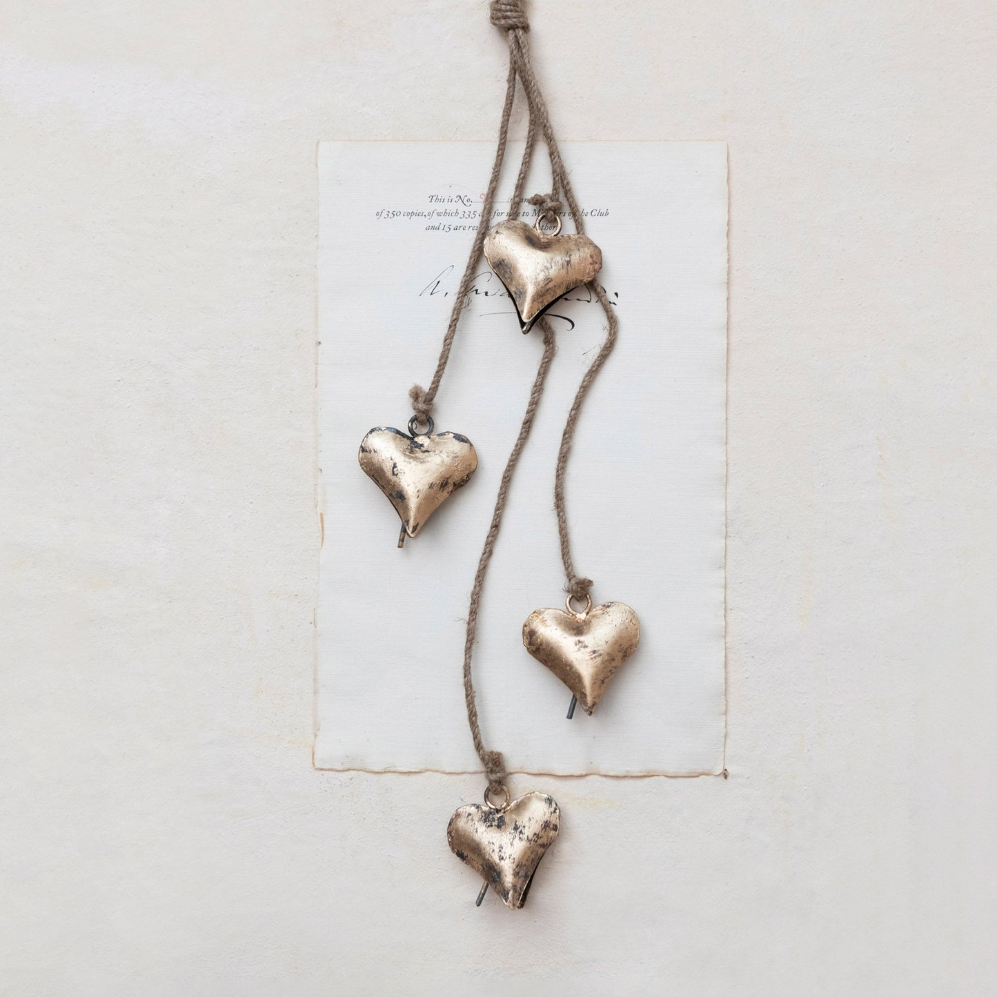 Metal Hearts on Jute Rope | Antique Brass Finish | 25.75 inches